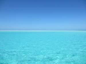 blue and white ocean during day time
